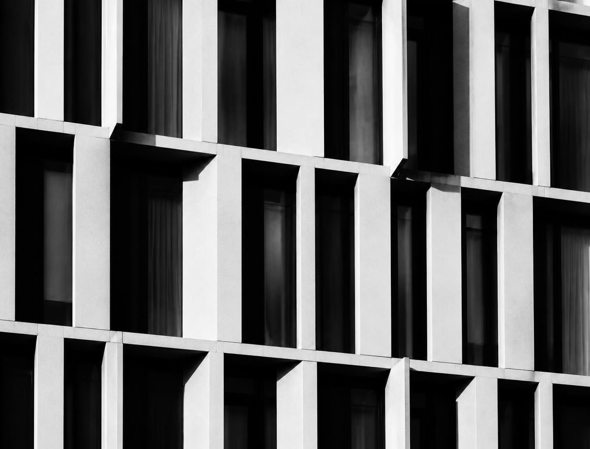 Black and white photograph of a structural facade grid